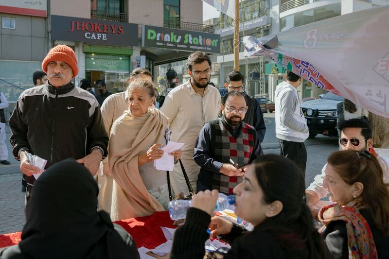 Voters register at a Pakistan Tehreek-e-Insaf voting registration camp in Lahore, Pakistan. Getty Images