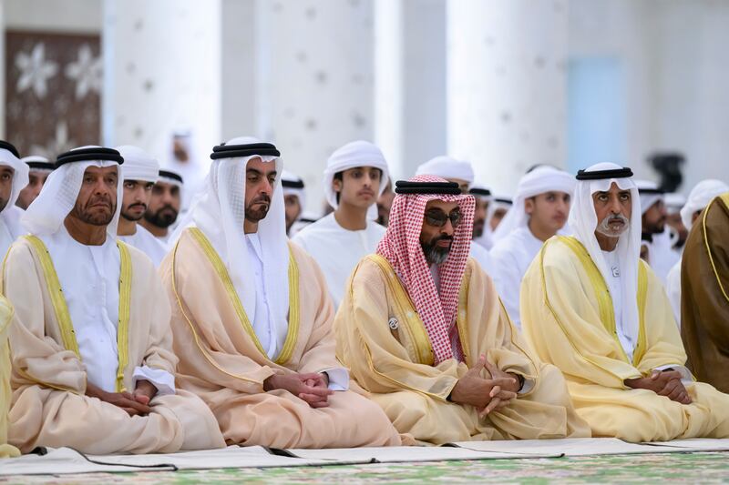 Sheikh Saif bin Zayed, Deputy Prime Minister and Minister of Interior, Sheikh Tahnoun bin Zayed, Deputy Ruler of Abu Dhabi, and Sheikh Nahyan bin Mubarak, Minister of Tolerance and Co-existence, attend Eid prayers at the Sheikh Zayed Grand Mosque. Wam