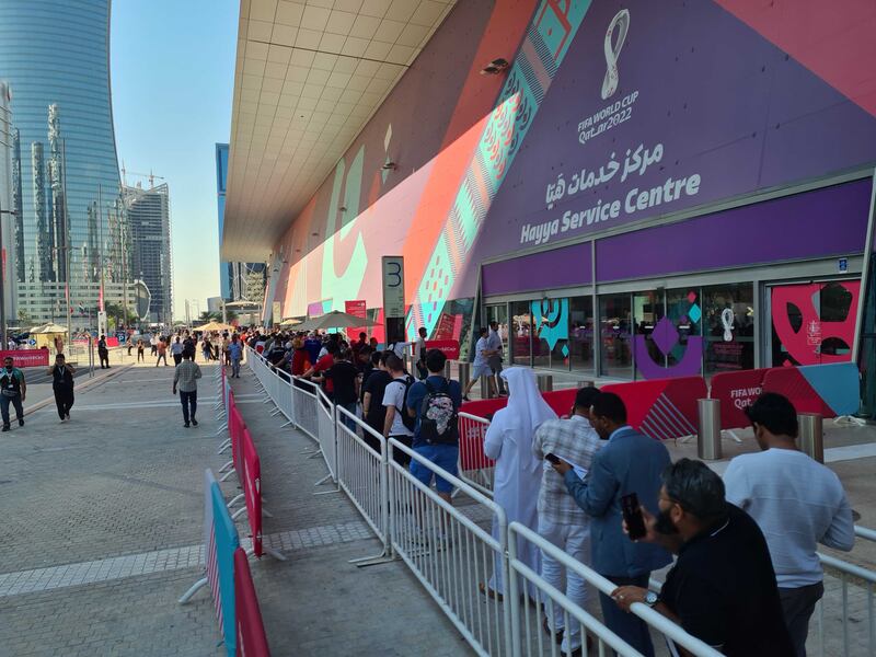 Fans queue for information outside the Hayya information centre in Doha. Sarah Forster / The National
