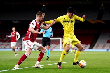 Arsenal's Rob Holding and Villarreal's Moreno Gerard battle for the ball during the UEFA Europa League Semi Final at the Emirates Stadium, London. PA