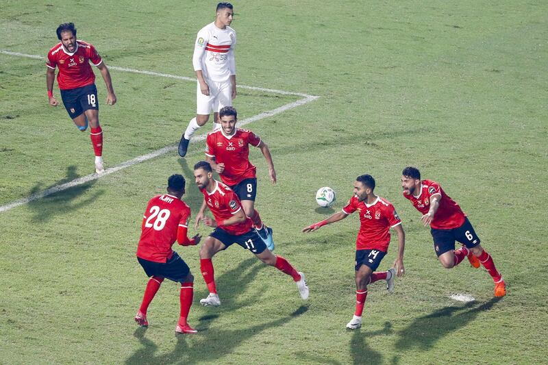 Ahly's midfielder Amr El Soleya (C, #17) runs to celebrate after scoring during the CAF Champions League Final football match between Egyptian sides Zamalek and Al-Ahly at the Cairo International Stadium in Egypt's capital on November 27, 2020. (Photo by Khaled DESOUKI / AFP)