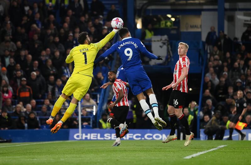 Brentford keeper David Raya is beaten to the ball by Chelsea's Pierre-Emerick Aubameyang, whose header goes over the bar. Getty 