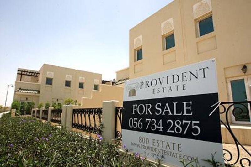 DUBAI , UNITED ARAB EMIRATES Ð May 27 , 2013 : Sales signboard outside the villas in Al Furjan area near Discovery Gardens in Dubai.  ( Pawan Singh / The National ) For Business Stock