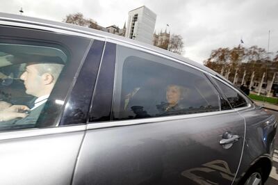 Britain's Prime Minister Theresa May reacts as she is driven into the House of Commons in central London on December 12, 2018 ahead of the weekly question and answer session, Prime Ministers Questions (PMQs). British Prime Minister Theresa May was hit by a no-confidence motion by her own party on December 12 over the unpopular Brexit deal she struck with EU leaders last month. Facing her biggest crisis since assuming office a month after Britons voted in June 2016 to leave Europe, May vowed to fight the coup attempt inside her own Conservative Party "with everything I've got".
 / AFP / Tolga AKMEN
