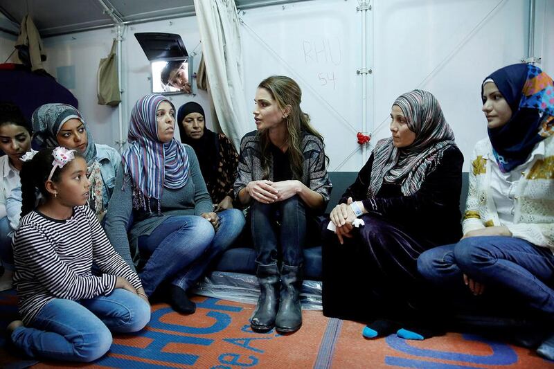 Queen Rania of Jordan chats with Syrian refugee women during her visit at the Kara Tepe refugee camp on the island of Lesbos, Greece, April 25, 2016. REUTERS/Alkis Konstantinidis