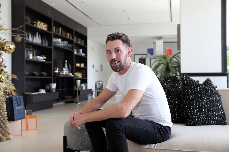 Ryan Almond in his one-bedroom apartment at the Seventh Heaven residential building at Al Barari, Dubai. All photos:  Pawan Singh / The National