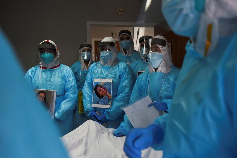 Healthcare workers treat patients infected with the coronavirus at United Memorial Medical Center in Houston, Texas. Callaghan O'Hare / Reuters