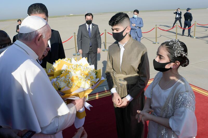 Pope Francis is welcomed at Erbil International Airport in Erbil, Iraq March 7, 2021. Vatican Media/­Handout via REUTERS    ATTENTION EDITORS - THIS IMAGE WAS PROVIDED BY A THIRD PARTY.