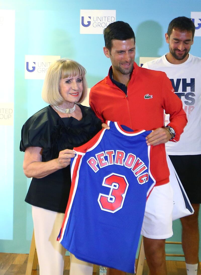 Serbia's Novak Djokovic poses next to Biserka Petrovic during a press conference in Zadar, Croatia on June 19. Reuters
