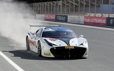 DUBAI , UNITED ARAB EMIRATES , DEC 06  – 2017:- Tani  Hanna , President of Ferrari Owners Club driving his Ferrari car at the Dubai Autodrome in Dubai. (Pawan Singh / The National) Story by Adam Workman