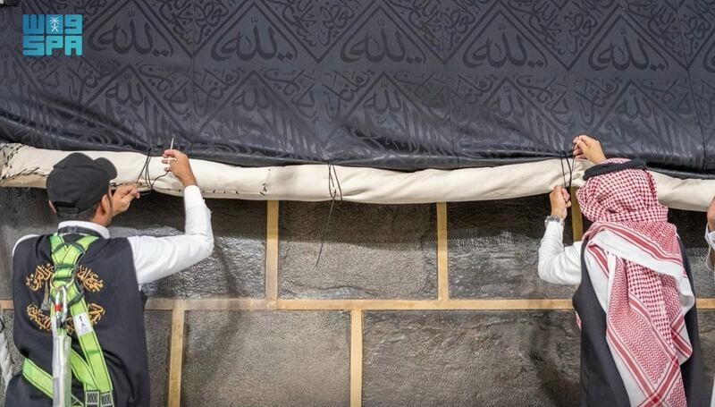 The raising of the lower part of the kiswa is a customary procedure performed annually by Saudi authorities in the run-up to Hajj. All photos: SPA