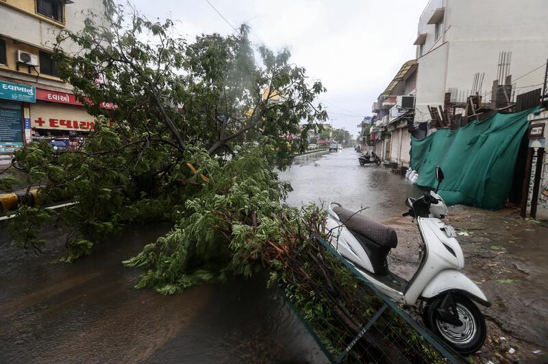Cyclone Tauktae hit the coastal areas of Gujarat with wind speeds up to 150kph, affecting  Kerala, Karnataka, Maharashtra and Goa. EPA