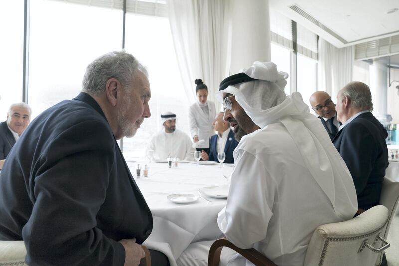 ABU DHABI, UNITED ARAB EMIRATES - November 24, 2018: HH Sheikh Mohamed bin Zayed Al Nahyan, Crown Prince of Abu Dhabi and Deputy Supreme Commander of the UAE Armed Forces (R), speaks with John Sexton, former President of New York University and CEO of The Catalyst (L), during the second day of the 2018 Formula 1 Etihad Airways Abu Dhabi Grand Prix, at Yas Marina Circuit. 

( Mohamed Al Hammadi / Ministry of Presidential Affairs )
---