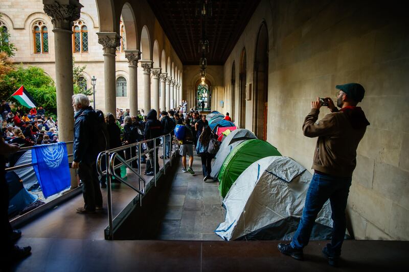 Students set up tents during a protest against the war in Gaza at the University of Barcelona. AP