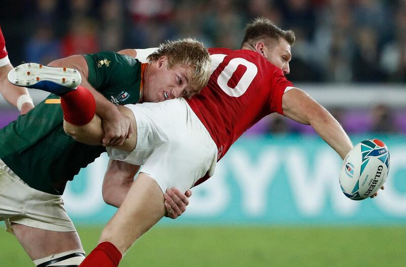 Rugby Union - Rugby World Cup - Semi Final - Wales v South Africa - International Stadium Yokohama, Yokohama, Japan Wales' Dan Biggar in action with South Africa's Pieter-Steph du Toit.  REUTERS