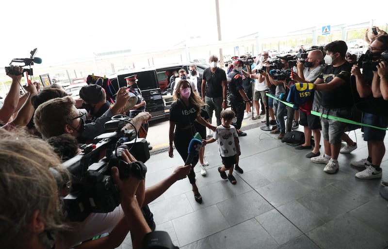 Lionel Messi arrives at Josep Tarradellas Barcelona-El Prat Airport with his wife Antonella and their children.