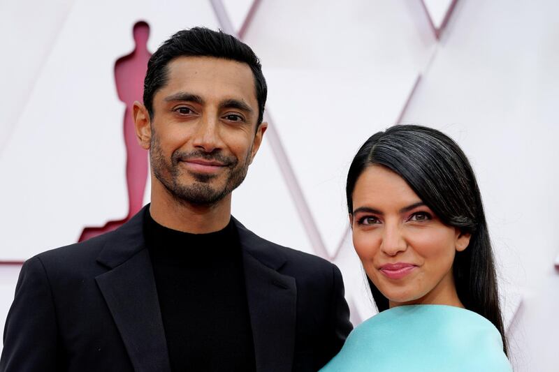 Riz Ahmed and Fatima Farheen Mirza arrive to the Oscars red carpet for the 93rd Academy Awards in Los Angeles, California, US, April 25, 2021. Reuters
