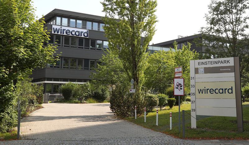 FILE PHOTO: FILE PHOTO: The headquarters of Wirecard AG, an independent provider of outsourcing and white label solutions for electronic payment transactions is seen in Aschheim near Munich, Germany, July 22, 2020. REUTERS/Michael Dalder/File Photo