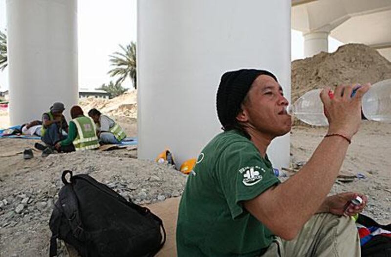 Outside jobs can be thirsty work, as this photograph, taken before Ramadan, shows.