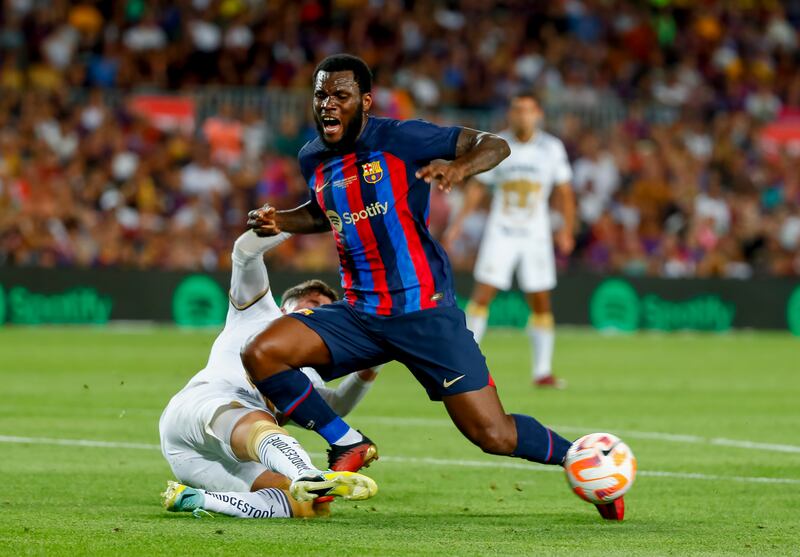 Franck Kessie 7 - On at half time, the new midfielder signed from AC Milan has impressed Xavi pre-season and he crossed for Aubameyang for the fifth. AP Photo