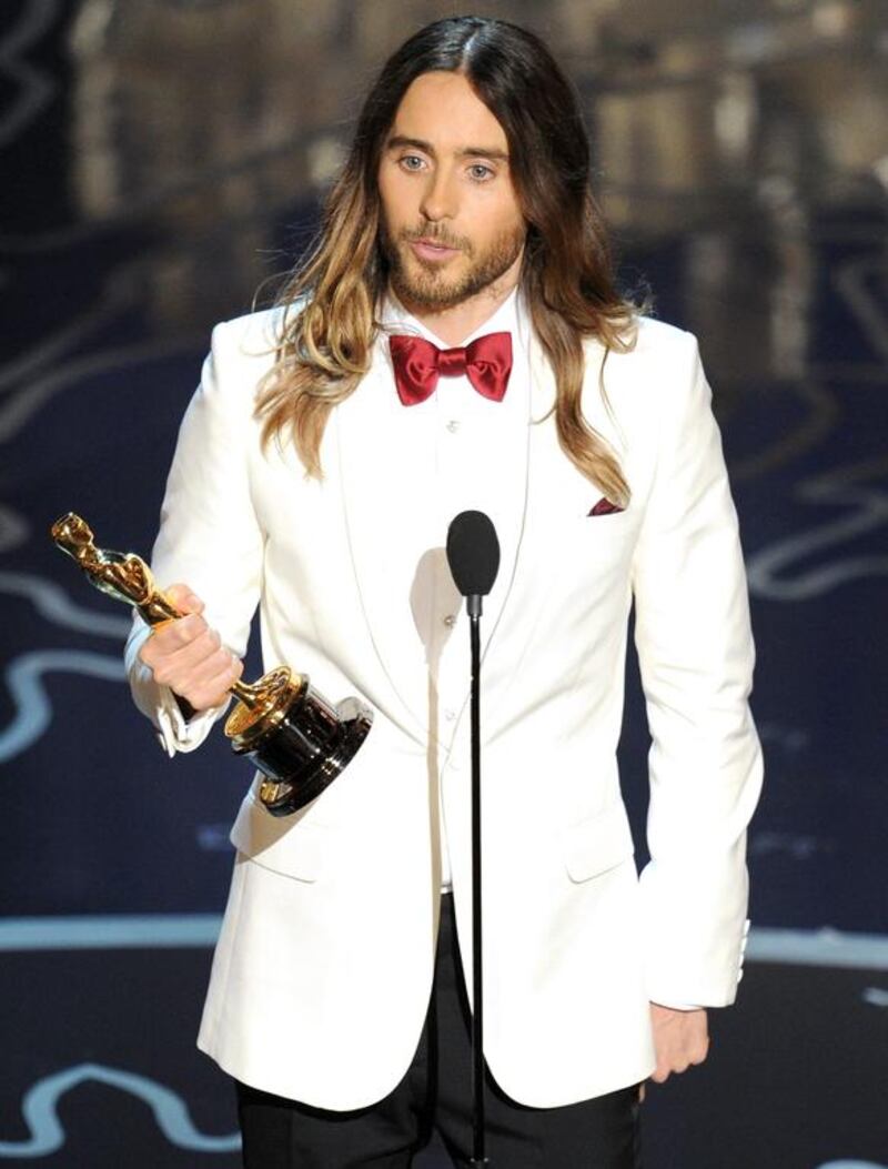 Jared Leto accepts the Best Performance by an Actor in a Supporting Role award for Dallas Buyers Club. Kevin Winter / Getty Images / AFP