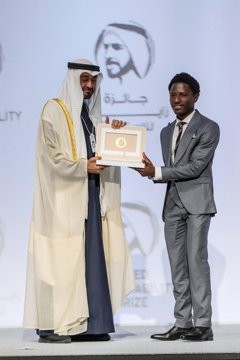 ABU DHABI, UNITED ARAB EMIRATES. 13 JANUARY 2020. The Zayed Sustainability Awards held at ADNEC as part of Abu Dhabi Sustainability Week. H.E. Sheikh Mohammed bin Zayed Al Nahyan, Crown Prince of Abu Dhabi and Deputy Supreme Commander of the United Arab Emirates Armed Forces awards Energy Winner: Food Winner: Okuafu Foundation, Ghana.  (Photo: Antonie Robertson/The National) Journalist: Kelly Clarker. Section: National.

