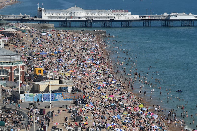 A packed Brighton beach during a heatwave in 2020.