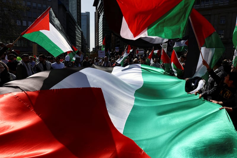 Demonstrators wave Palestinian flag in Frankfurt. Palestine's bid to join the UN appears to have little chance of success in its current form. Reuters