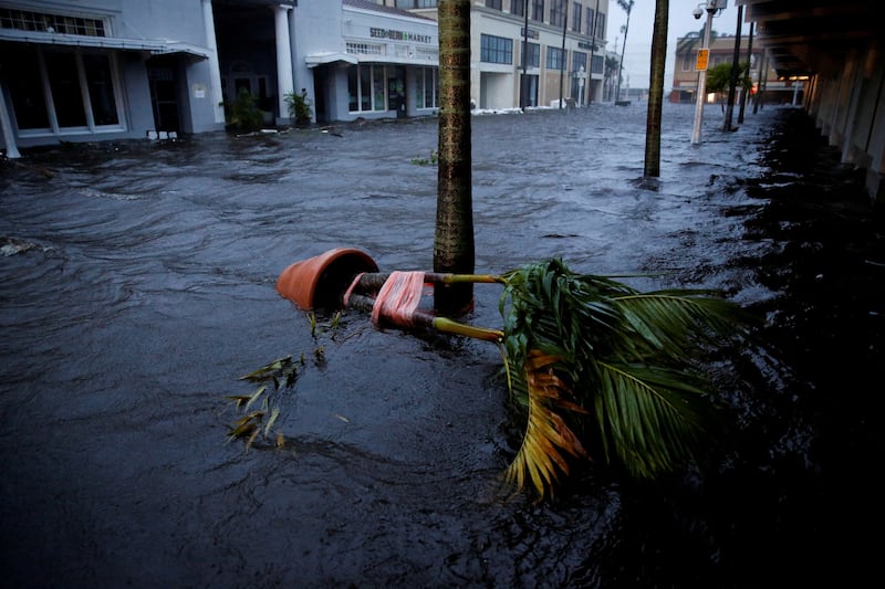 A flooded street in central Fort Myers. Reuters