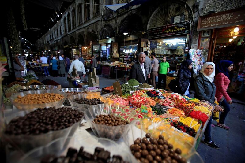 People are seen in the souk in the old city of Damascus, Syria. Reuters