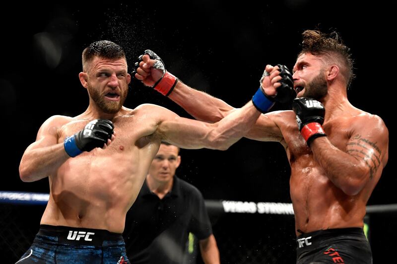 JACKSONVILLE, FLORIDA - MAY 09: Jeremy Stephens (R) of the United States fights Calvin Kattar (L) of the United States in their Featherweight fight during UFC 249 at VyStar Veterans Memorial Arena on May 09, 2020 in Jacksonville, Florida.   Douglas P. DeFelice/Getty Images/AFP
