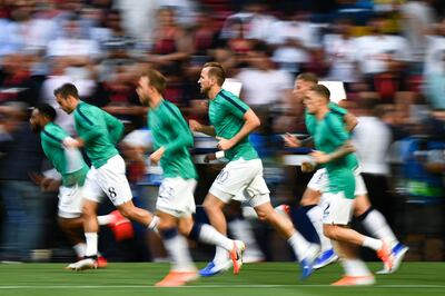 TOPSHOT - Tottenham Hotspur's English forward Harry Kane (C) and teammates warm up before the UEFA Champions League final football match between Liverpool and Tottenham Hotspur at the Wanda Metropolitano Stadium in Madrid on June 1, 2019. / AFP / GABRIEL BOUYS                     
