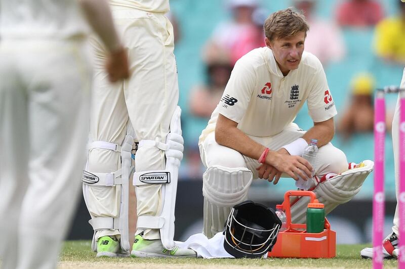 epa06424236 England's captain Joe Root squats as he takes a drinks break on Day Five of the Fifth Test cricket match between Australia and England at the Sydney Cricket Ground (SCG) in Sydney, New South Wales, Australia, 08 January 2018.  EPA/DEAN LEWINS -- EDITORIAL USE ONLY, IMAGES TO BE USED FOR NEWS REPORTING PURPOSES ONLY, NO COMMERCIAL USE WHATSOEVER, NO USE IN BOOKS WITHOUT PRIOR WRITTEN CONSENT FROM AAP -- AUSTRALIA AND NEW ZEALAND OUT