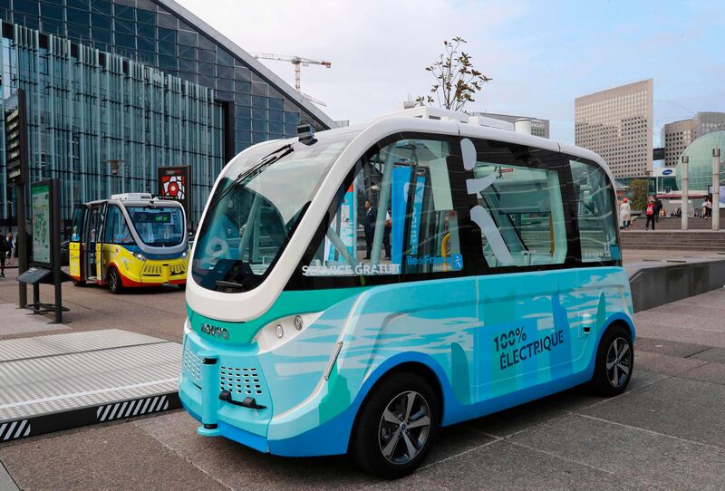 (FILES) This file photo taken on July 3, 2017 shows the new bus shuttle, launched by Keolis, Navya and the Stif, is parked in the business district of La Defense in the northwestern suburbs of Paris.
A self-drivingArma shuttle, made by French firm Navya, was involved in a minor bang-up with a delivery truck during a test in Las Vegas streets on November 8, 2017, with city officials blaming the human driver. The driver of the truck was issued a traffic ticket, Las Vegas officials said in an online post about what they called a minor collision. / AFP PHOTO / JACQUES DEMARTHON