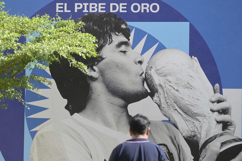 An image of late football star Diego Maradona is seen on the second anniversary of his death at CONMEBOL fan zone "Tree of dreams" during the Qatar 2022 World Cup football tournament in Doha, on November 25, 2022. AFP