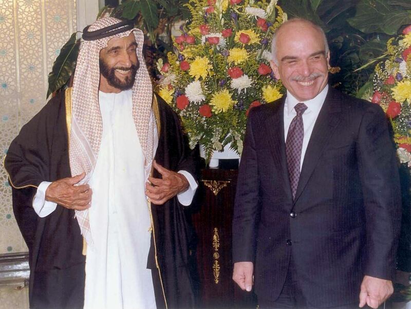 (FILES) -- This handout picture released by the United Arab Emirates' (UAE's) official news agency WAM 07 January 2002 shows Emirati leader Sheikh Zayed bin Sultan al-Nahyan (L) in an undated picture taken in Abu Dhabi in the 1990s with Jordan's late King Hussein, the father of King Abdullah II, who is currently visiting the Emirates. King Abdullah is visiting the UAE and Bahrain for talks on bilateral ties and international developments. After years of tension which followed the 1990-91 Gulf War crisis, relations between Amman and the Gulf's oil monarchies have thawed over the past four years. AFP PHOTO/Yussef ALLAN (Photo by WAM / AFP)