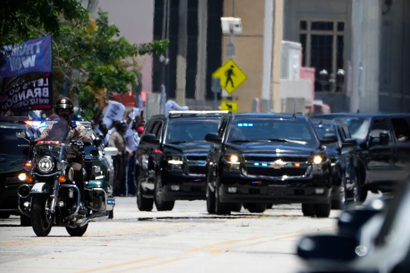 Mr Trump's motorcade arrives at the US federal courthouse in Miami. AP