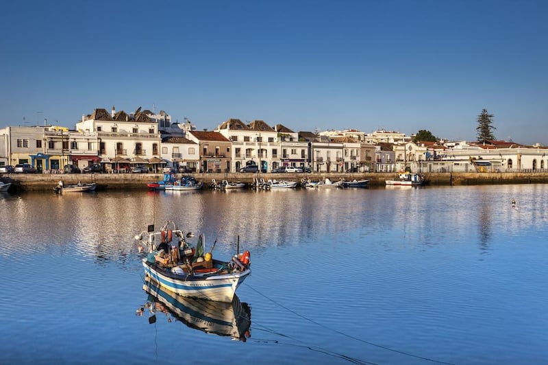 Tavira, built on either side of the Gilão River, also enjoys one of the Algarve’s best beaches, the 11-kilometre-long Ilha de Tavira. Getty Images