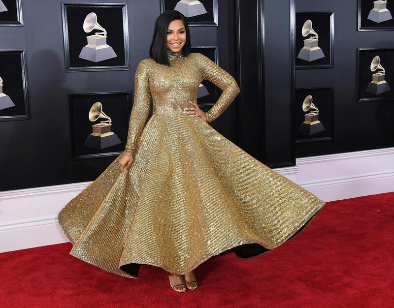 R&B legend Ashanti opted for a fun full-skirt affair by Yas Couture by Elie Madi. Fast fact: Elie Madi is a Kuwait-based Lebanese designer. Angela Weiss / AFP