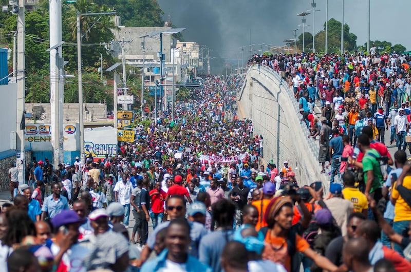 Protesters take part in a march against the government in Port-au-Prince, Haiti.  EPA