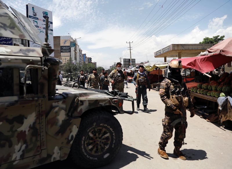 Afghan security forces arrive at the site of an attack in Kabul, Afghanistan. REUTERS