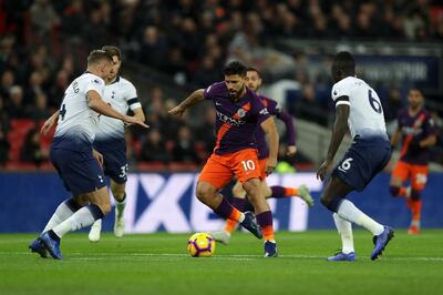 LONDON, ENGLAND - OCTOBER 29:  Sergio Aguero of Manchester City is challenged by Toby Alderweireld and Davinson Sanchez of Tottenham Hotspur during the Premier League match between Tottenham Hotspur and Manchester City at Wembley Stadium on October 29, 2018 in London, United Kingdom.  (Photo by Richard Heathcote/Getty Images)