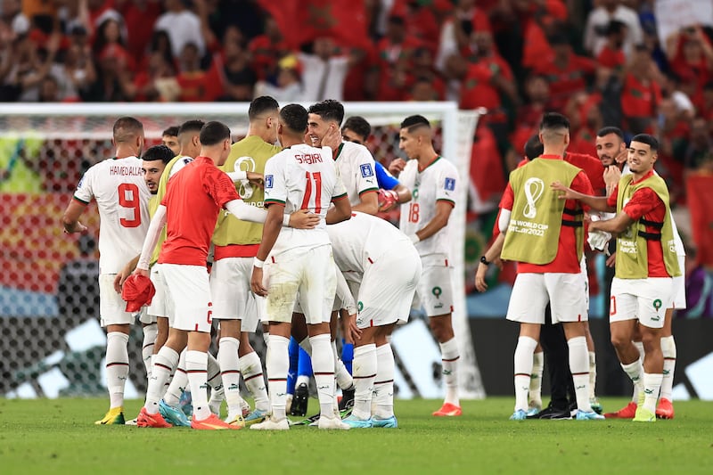 Morocco players celebrate the 2-0 Group F win against Belgium  at Al Thumama Stadium on November 27, 2022 in Doha. Getty