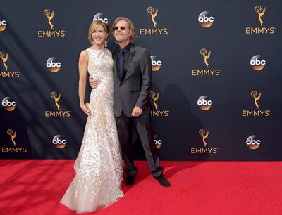 Felicity Huffman with her husband William H Macy, who has not been charged. AP