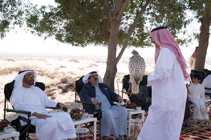 AL DHAFRA, ABU DHABI, UNITED ARAB EMIRATES - February 09, 2018: HH Sheikh Mohamed bin Zayed Al Nahyan Crown Prince of Abu Dhabi Deputy Supreme Commander of the UAE Armed Forces (L) and HM King Hamad bin Isa Al Khalifa, King of Bahrain (2nd L), participate in a falcon hunt.

( Mohamed Al Hammadi / Crown Prince Court - Abu Dhabi )
---