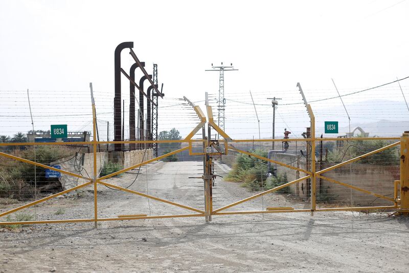 A border gate is closed on a bridge leading from Israel to Jordan, in the Jordan valley area called Baqura, Jordanian territory that was leased to Israel under the 1994 peace agreement between the two countries. AP