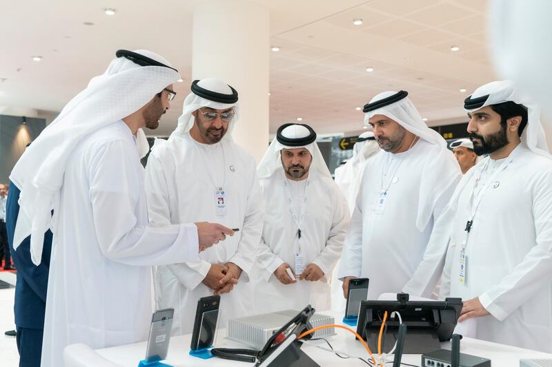 ABU DHABI, UNITED ARAB EMIRATES - February 20, 2019: HH Sheikh Mohamed bin Zayed Al Nahyan, Crown Prince of Abu Dhabi and Deputy Supreme Commander of the UAE Armed Forces (2nd R) visits Etimad Holding stand, during the 2019 International Defence Exhibition and Conference (IDEX), at Abu Dhabi National Exhibition Centre (ADNEC). 

( Rashed Al Mansoori / Ministry of Presidential Affairs )
---