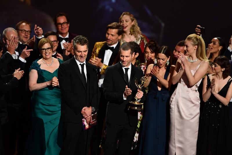 D.B. Weiss (C) and cast and crew of "Game of Thrones" accept the Outstanding Drama Series award onstage during the 71st Emmy Awards at the Microsoft Theatre in Los Angeles on September 22, 2019. AFP