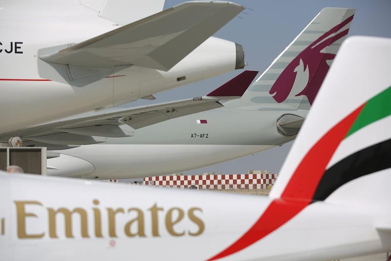 Emirates today took off for Auckland, while Qatar Airways, pictured rear, plans to follow suit. Getty Images