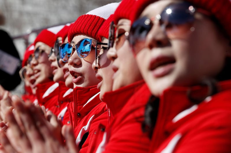 North Korean cheerleaders react at the women's slalom. Jorge Silva / Reuters